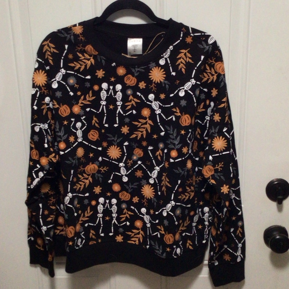 Women’s Black Crewneck Sweater with Orange & White Halloween Motif